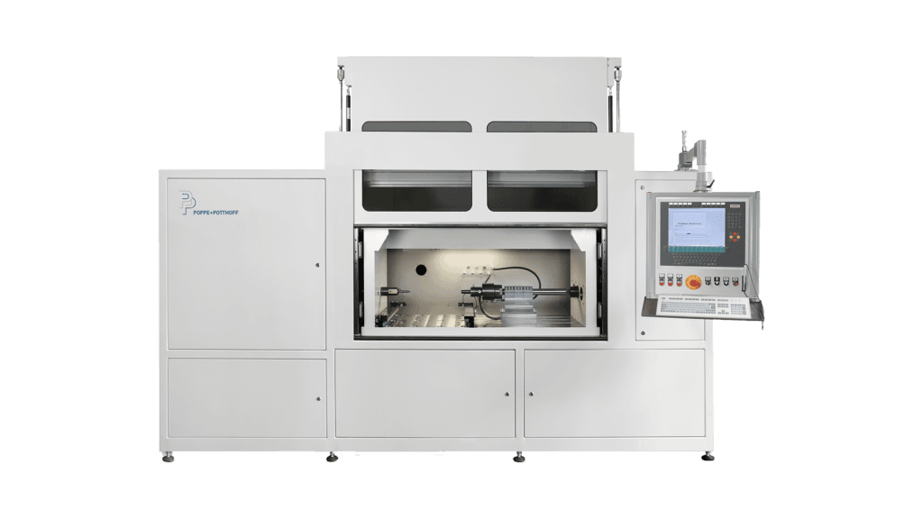 Autofrettage machine with open test chamber door and fixture