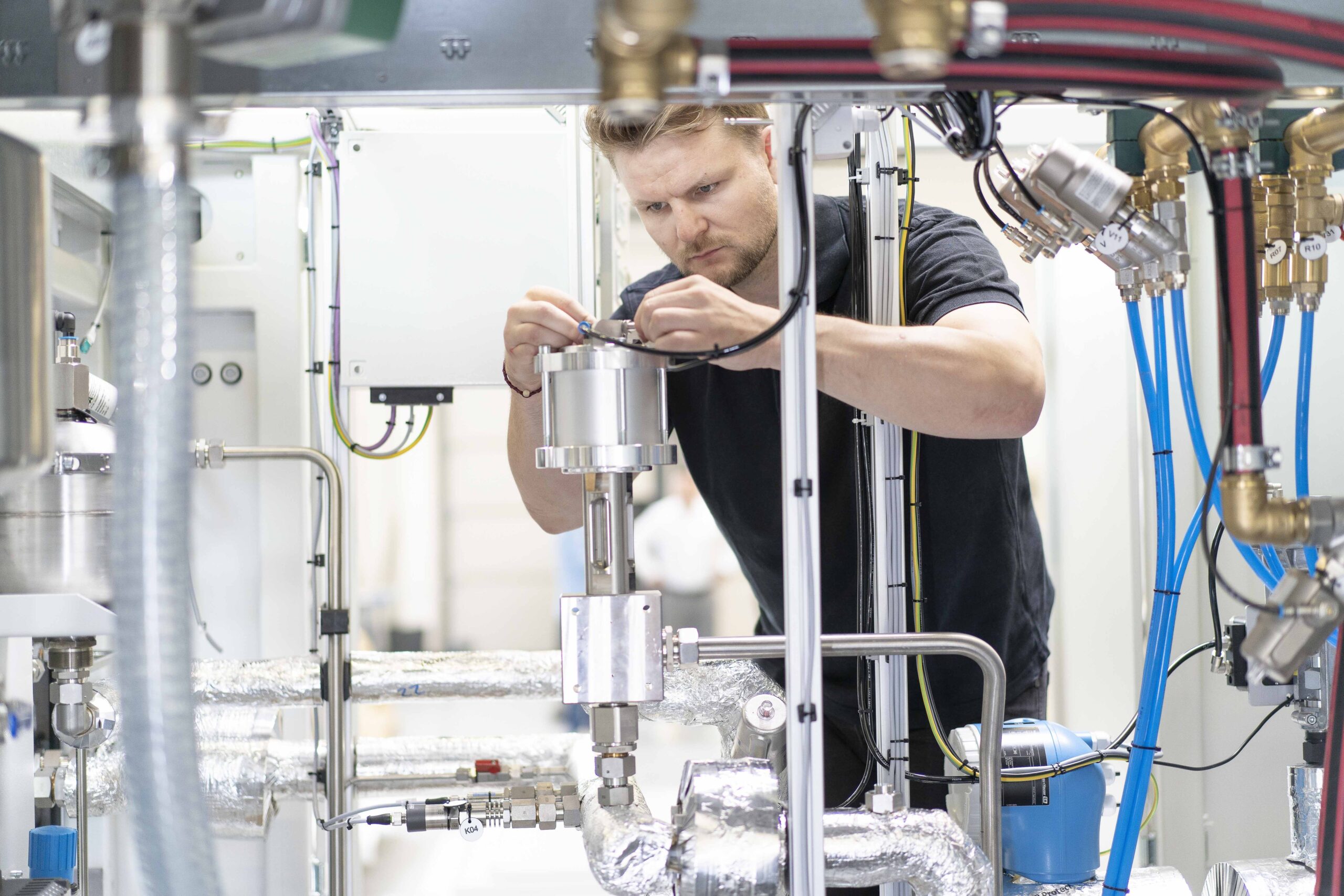Janes Borchard working on a valve